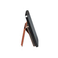 Tony Perotti Furbo EVO SMART MAGSAFE card holder in Dark Brown vegetable-tanned leather on an iPhone, side view with the flap folded out as a stand