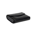 Tony Perotti Double Furbo card holder with coin pocket in Black vegetable-tanned leather, closed, showing the coin flap and embossed logo