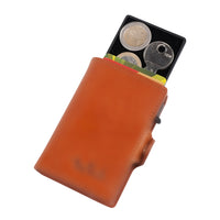 Brown leather wallet with coins on a white background