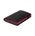 Tony Perotti SLIM Furbo card holder in Black & Fuchsia Italian vegetable-tanned leather, closed and lying flat, with fuchsia case and stitching