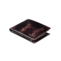 Tony Perotti billfold in Black Van Gogh vegetable-tanned Tuscan leather, closed and lying flat, with embossed logo
