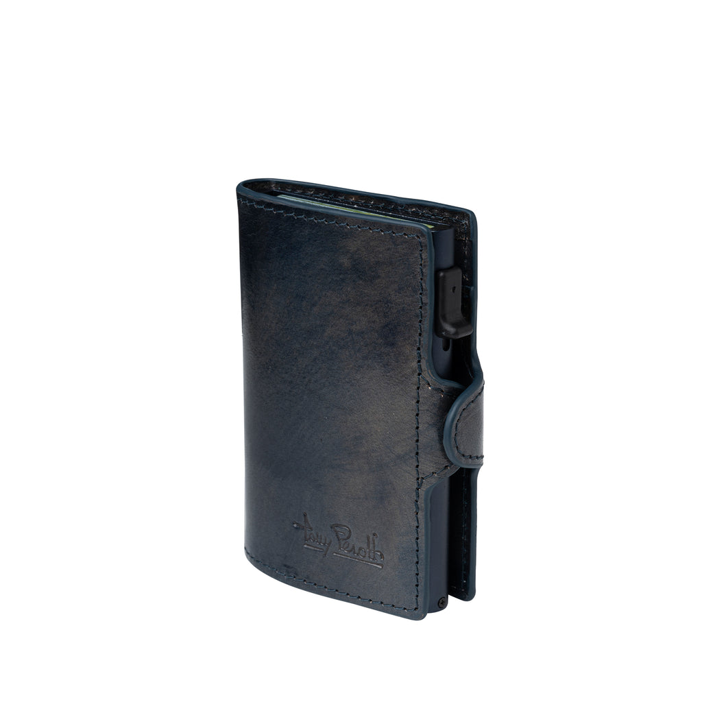 Tony Perotti Van Gogh blue leather card holder standing upright, closed, front three-quarter view
