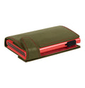Tony Perotti COIN Furbo card holder Swiss Edition in Green & Red Arno vegetable-tanned Tuscan leather, closed, showing the red aluminium case