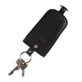 Tony Perotti bell-shaped key pouch in Black Italian vegetable-tanned leather, keys pulled out on the press-stud key strap and ring