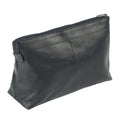 Tony Perotti large toiletry bag in Black Italian vegetable-tanned leather, closed, three-quarter view with top zip and side pull tab