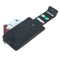 Tony Perotti medium travel wallet in Black Italian vegetable-tanned leather with flap open, showing a passport, euro notes and card slots