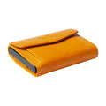 Tony Perotti COIN Furbo card holder in Orange Italian vegetable-tanned leather, closed, showing the coin pocket flap and embossed logo